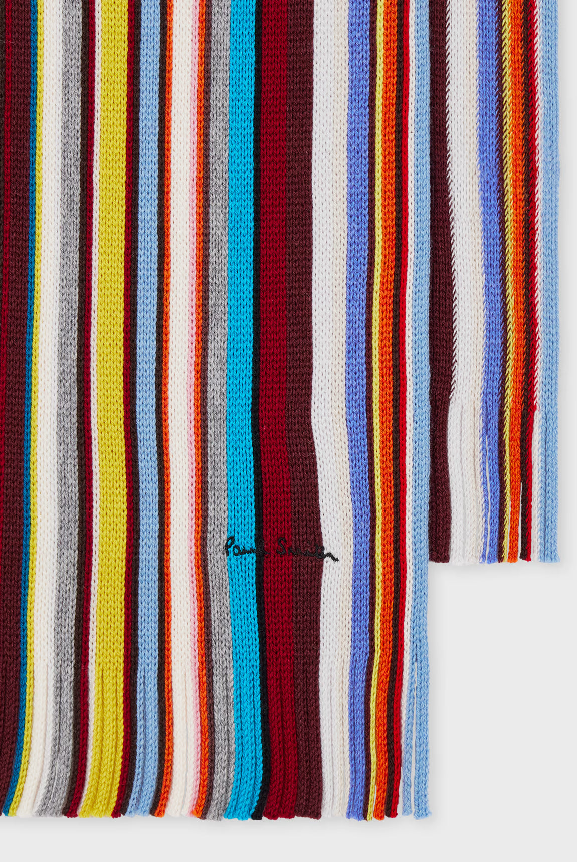Multicolored striped fabric with a brand logo on a white background