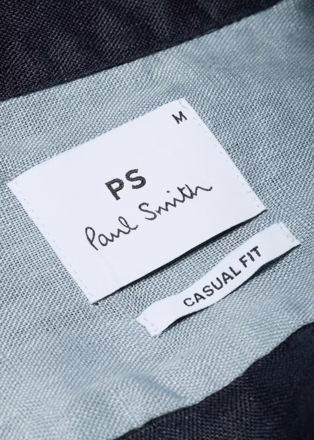 Label on a garment with 'PS Paul Smith' branding
