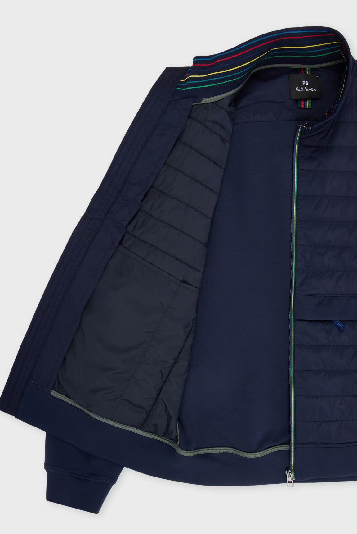 Navy blue puffer jacket with a colorful lining on a white background