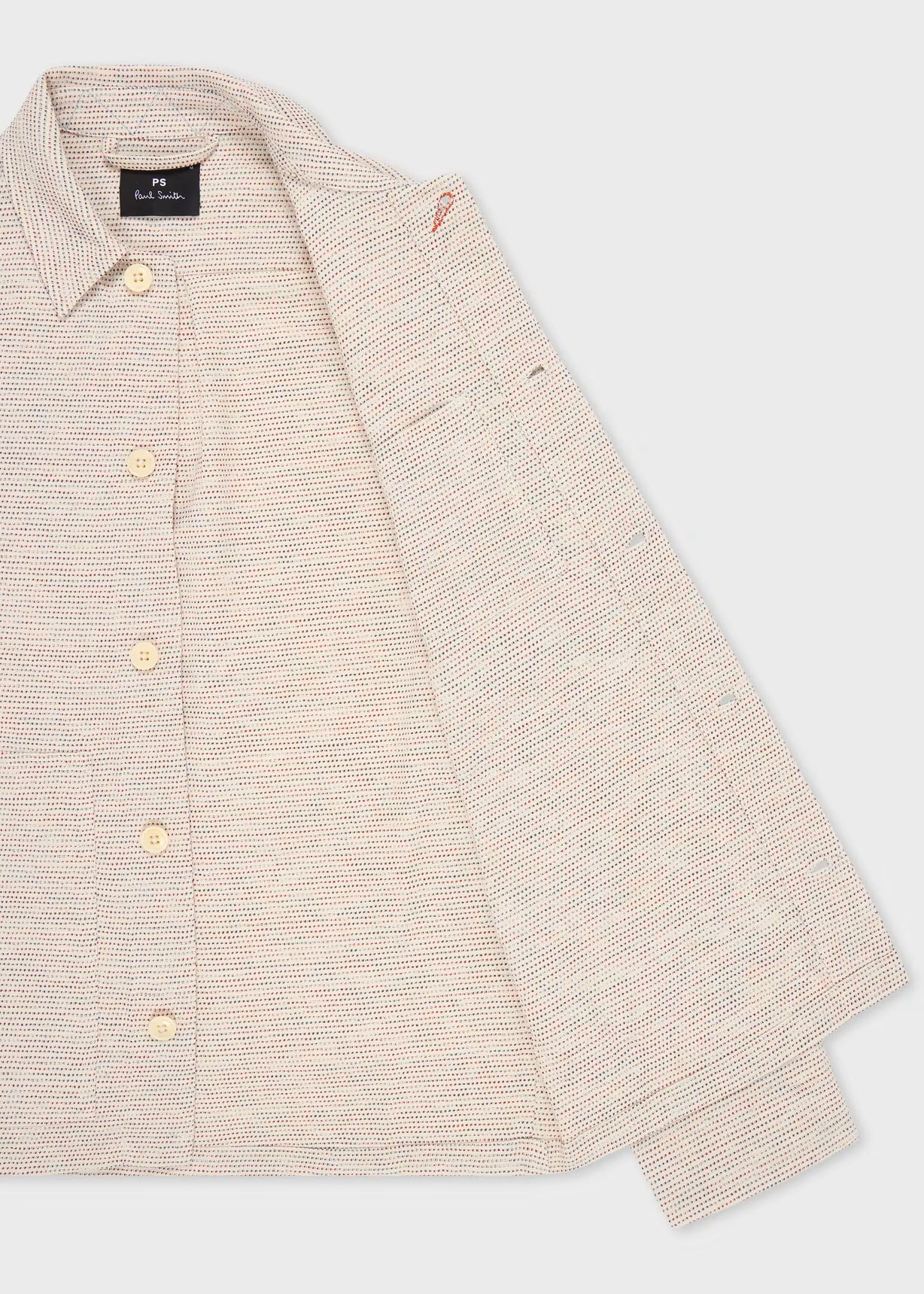 Beige button-up shirt on a light gray background
