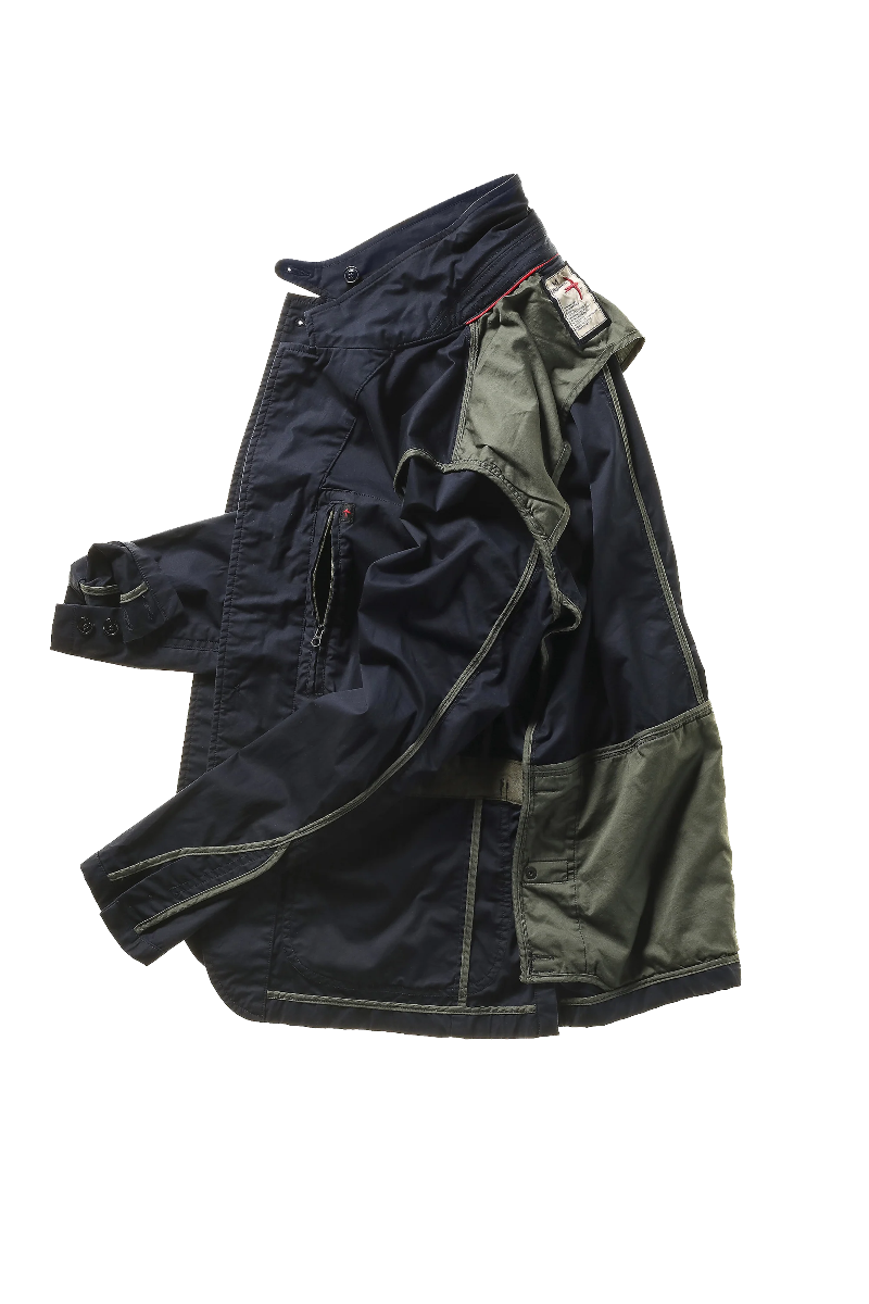 Navy and green jacket on a white background