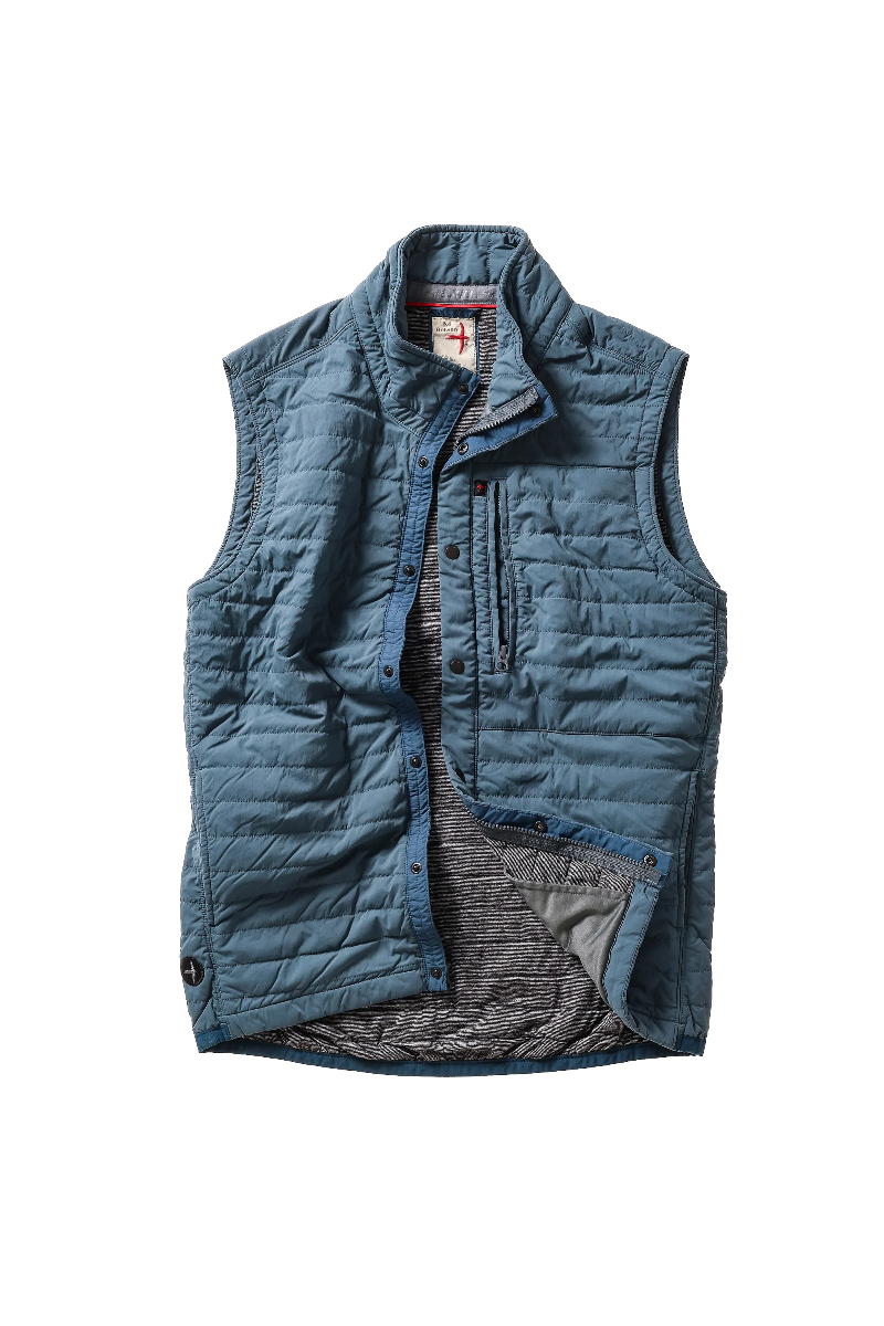 Blue quilted vest on a white background