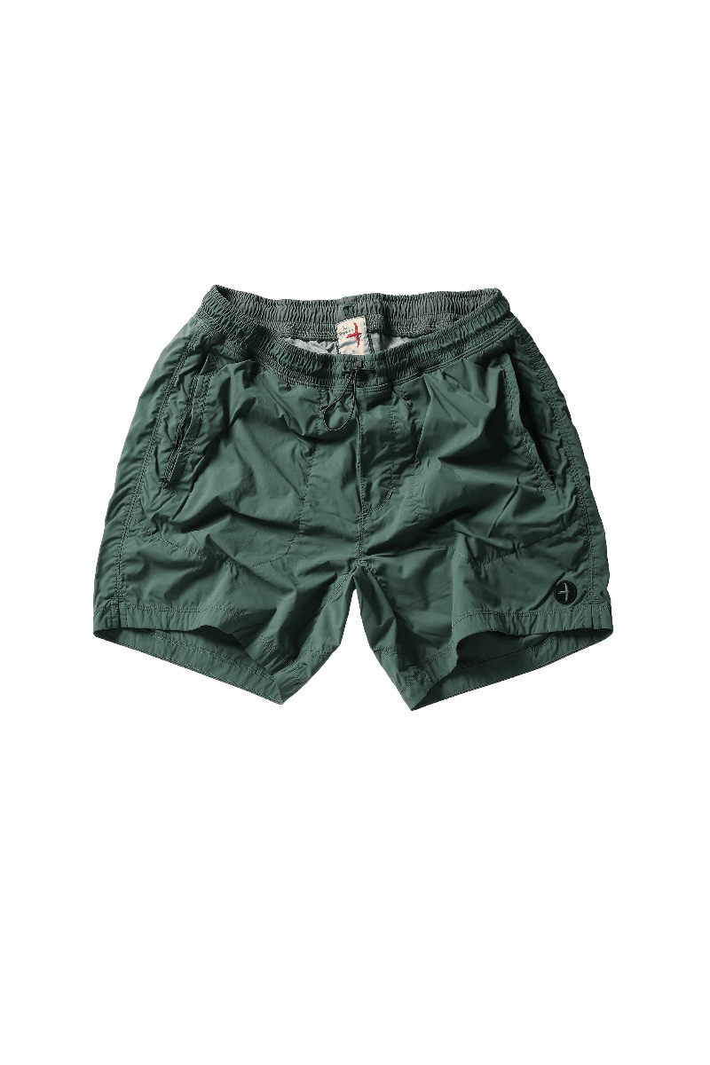 Green shorts on a white background