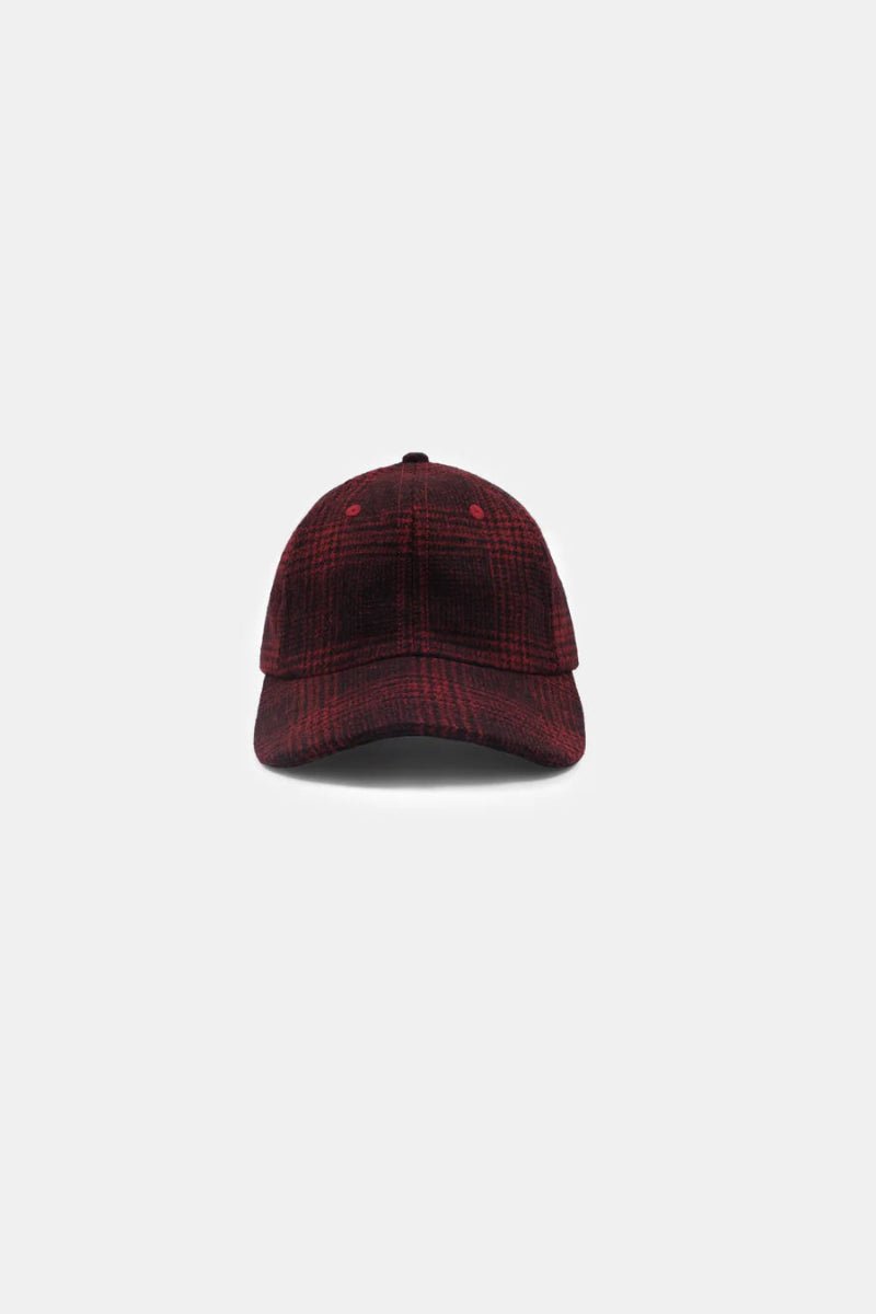 Red plaid cap on a white background