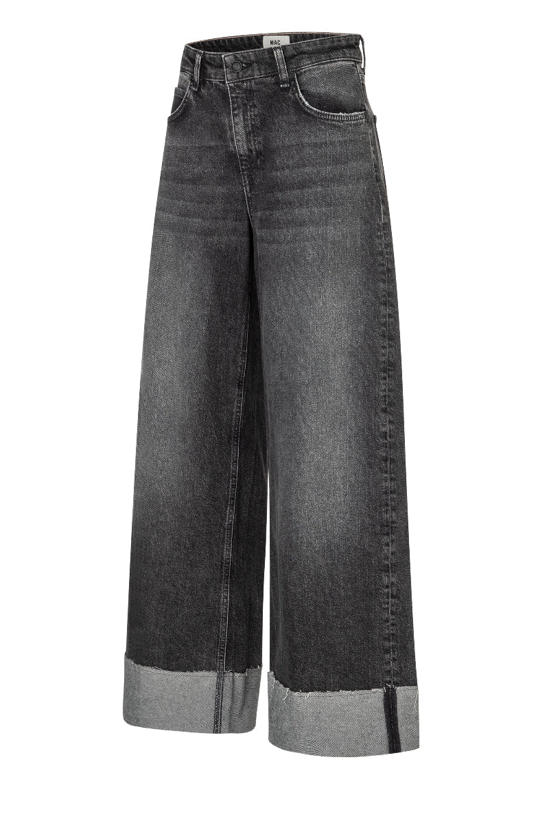 Black wide-leg jeans on a white background