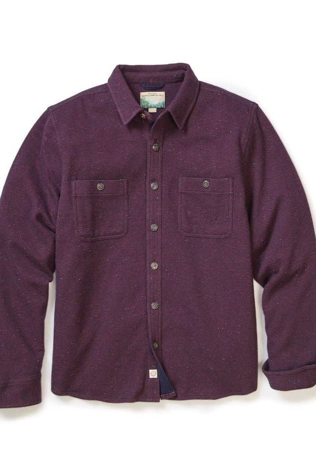 Purple flannel shirt on a white background