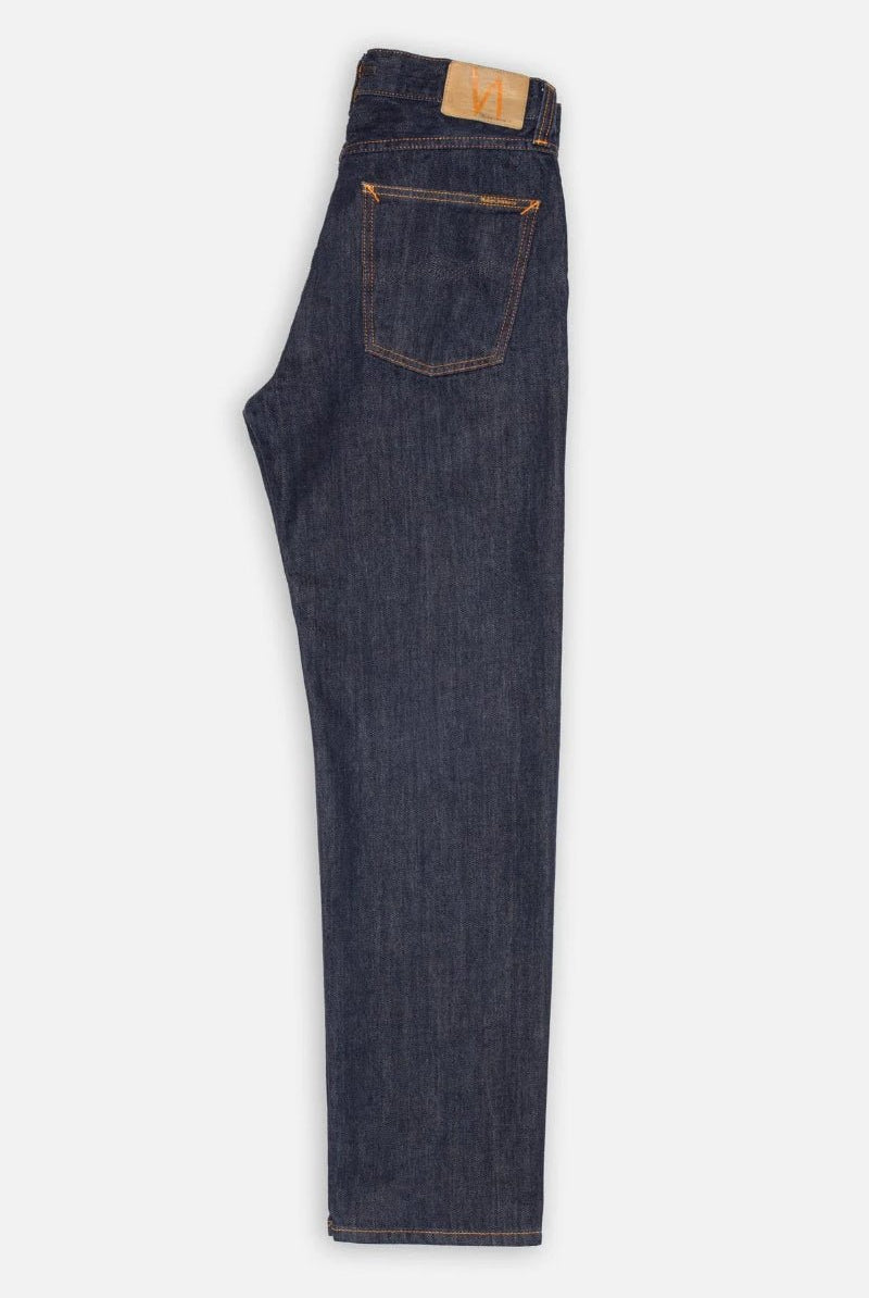 Pair of dark blue jeans on a white background