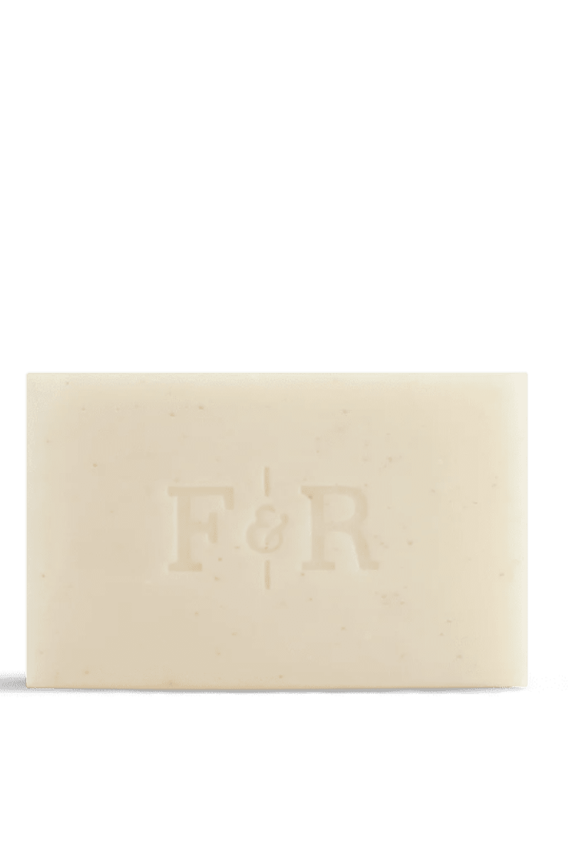 Beige bar of soap with 'F&R' branding on a white background