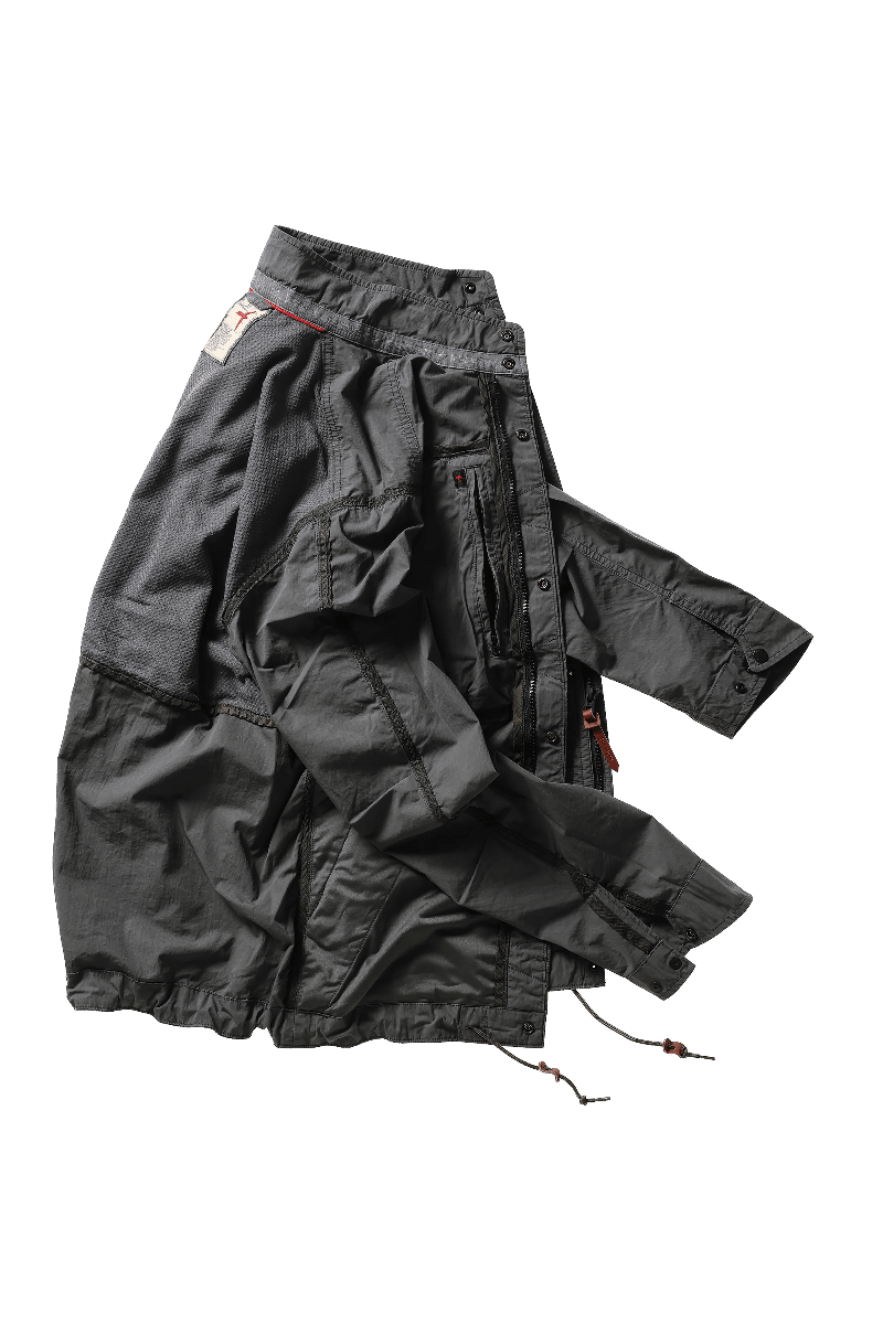 Black jacket with multiple pockets on a white background