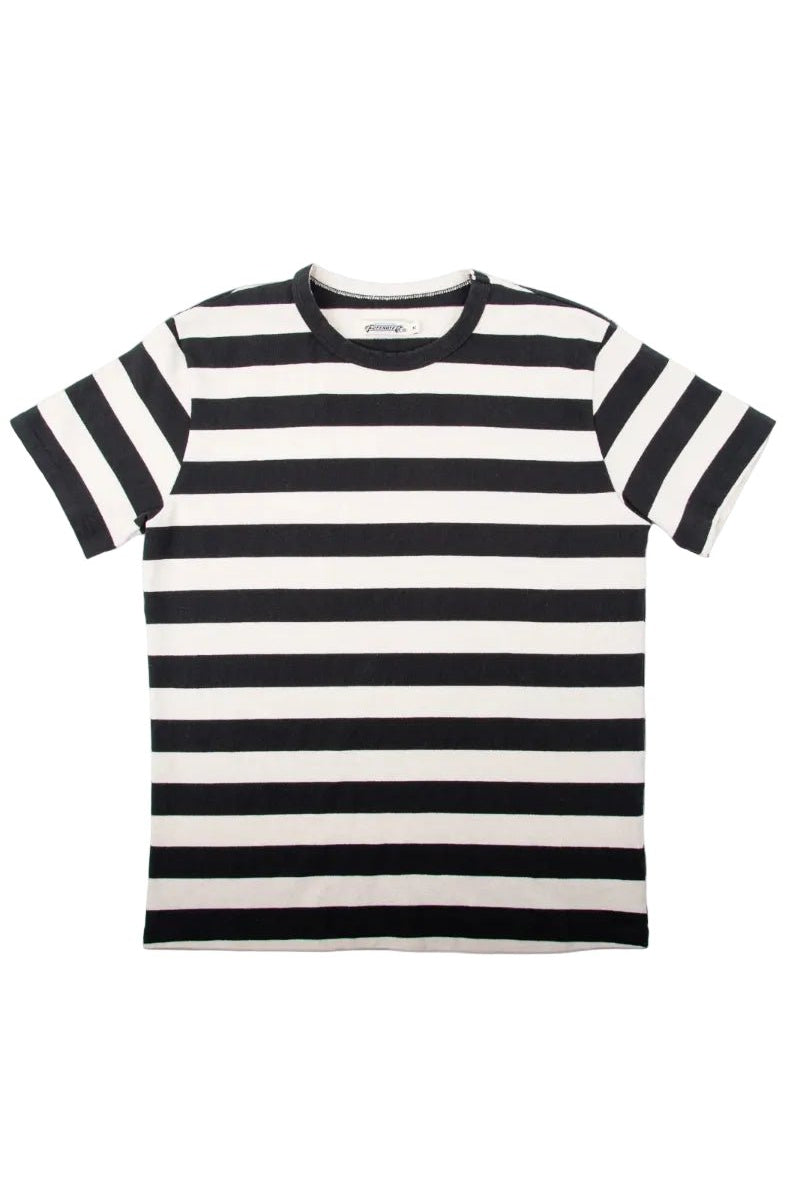 Black and white striped t-shirt on a light gray background