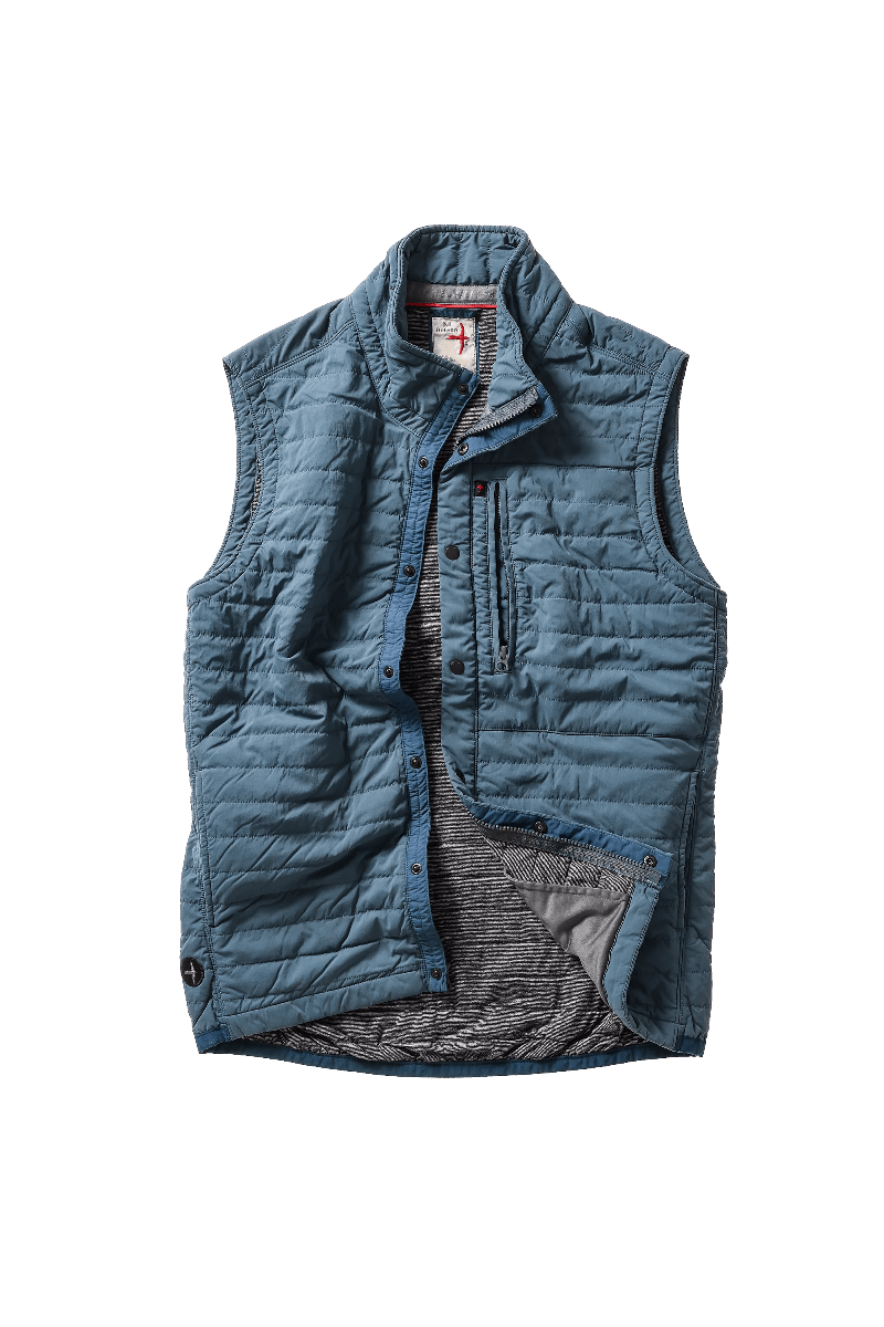 Blue quilted vest on a white background