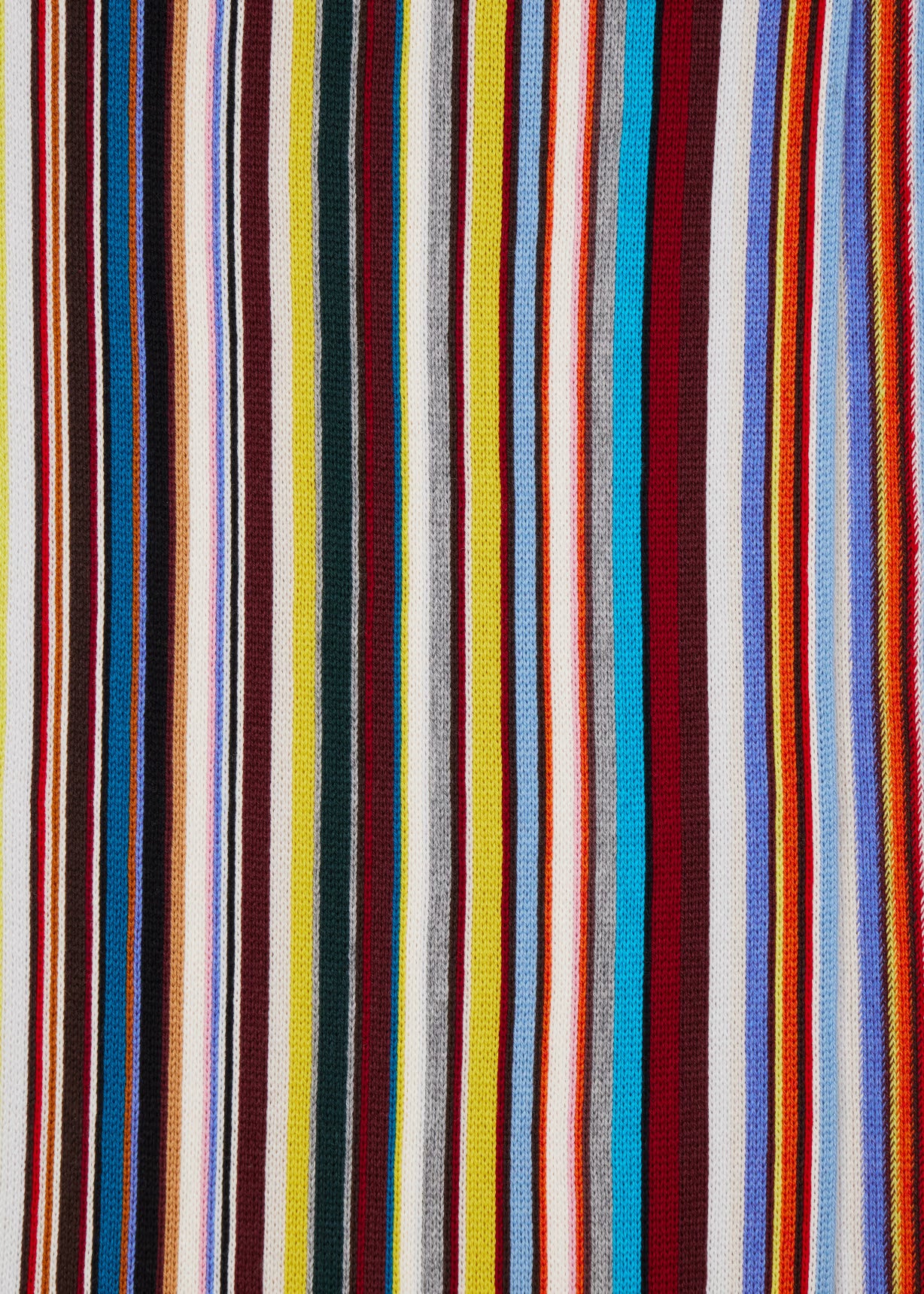 Close-up of multicolored striped fabric with vertical lines.