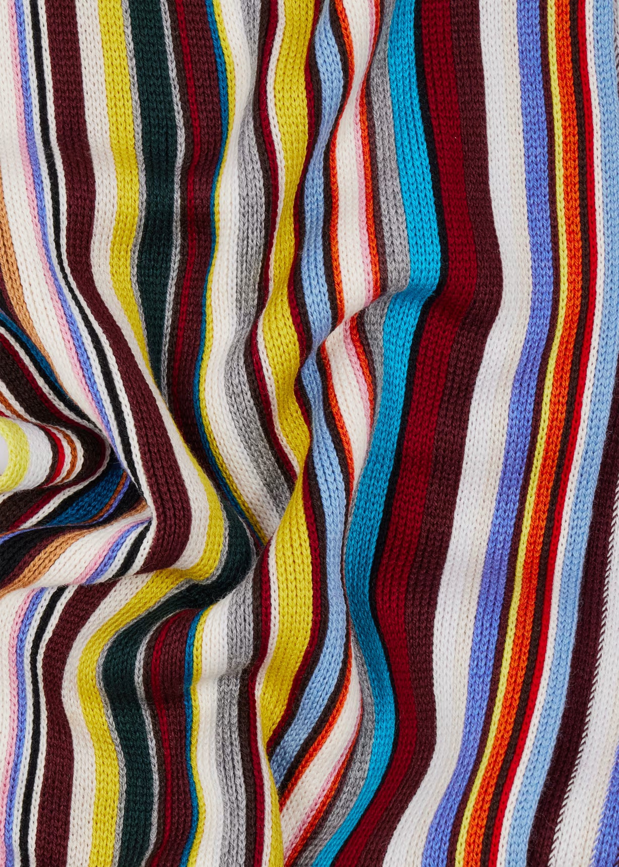 Close-up of a multicolored striped fabric with wavy pattern
