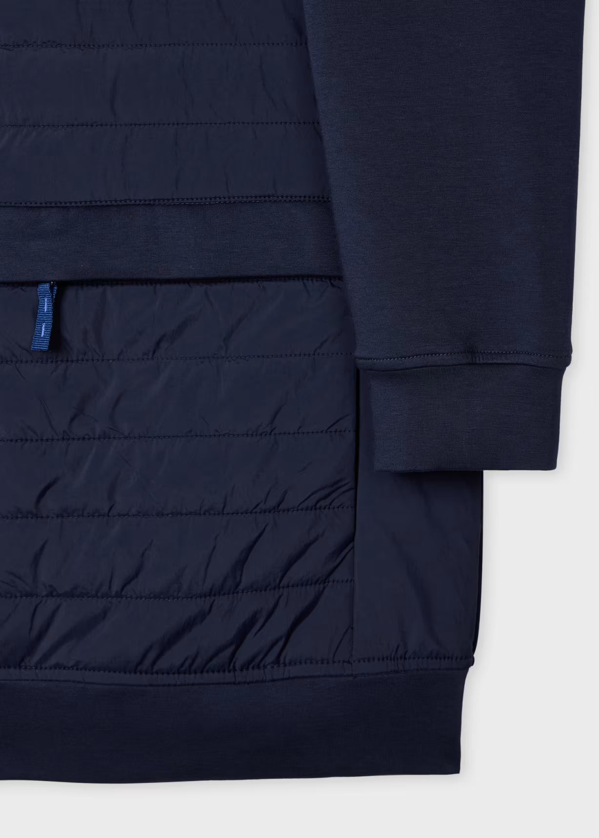 Navy blue jacket with quilted design on a white background
