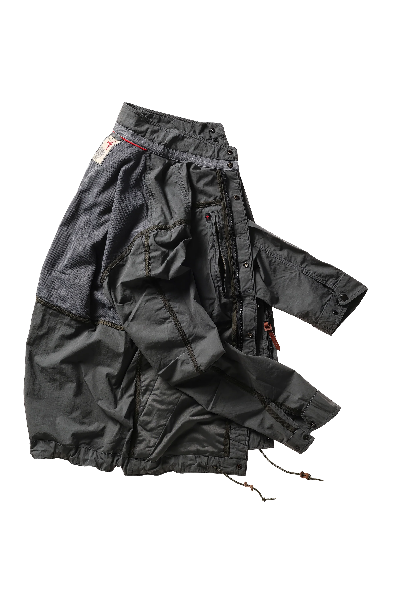 Black jacket with multiple pockets on a white background