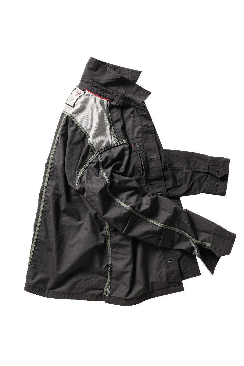 Black jacket with a white label on a white background