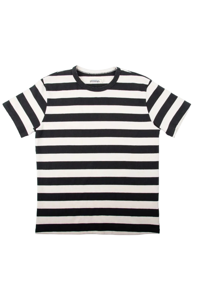 Black and white striped t-shirt on a light gray background