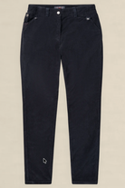 A pair of slim-fit dark navy corduroy pants laid flat against a light beige background. The pants feature a button closure, belt loops, and a small white embroidered logo near the lower left leg.