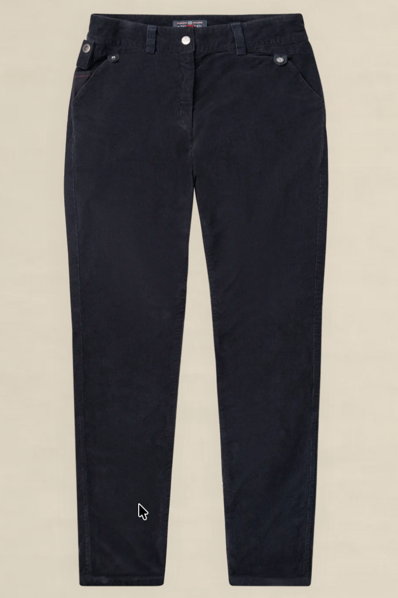A pair of slim-fit dark navy corduroy pants laid flat against a light beige background. The pants feature a button closure, belt loops, and a small white embroidered logo near the lower left leg.
