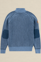 A blue striped knit sweater with dark blue patch pockets on the front and sleeves, shown from the back on a light beige background.