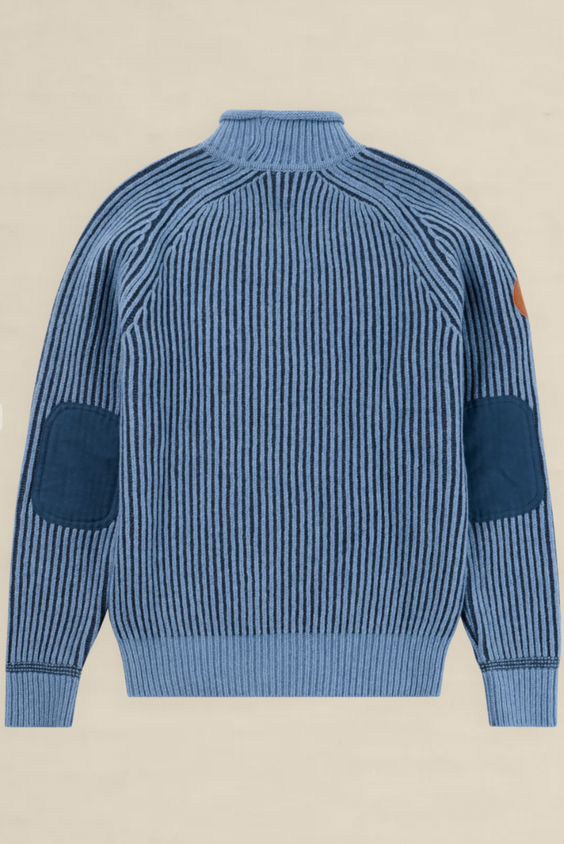 A blue striped knit sweater with dark blue patch pockets on the front and sleeves, shown from the back on a light beige background.