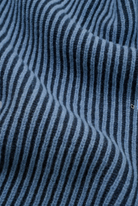 A close-up of a blue and black striped knit fabric with a soft, ribbed texture.