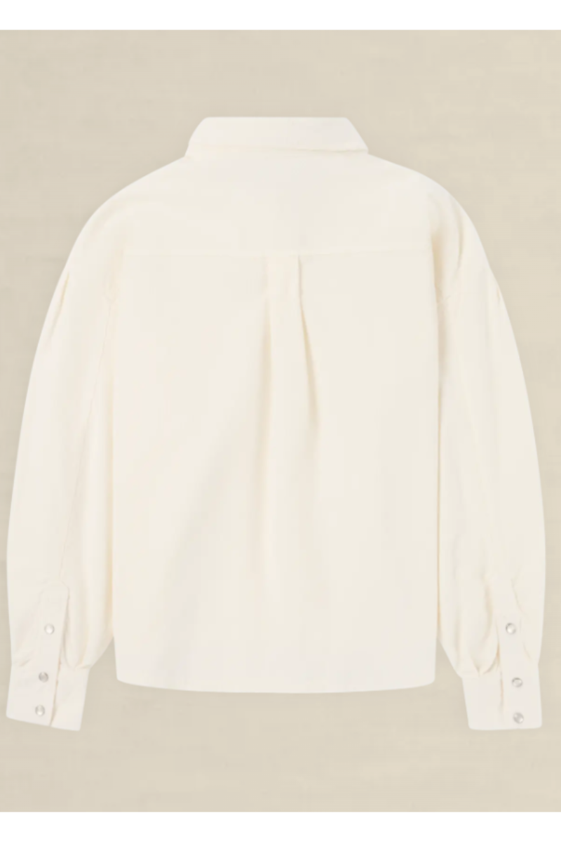 An off-white long-sleeve button-up shirt shown from the back, featuring a subtle pleat detail at the center back and buttoned cuffs, displayed against a neutral beige background.