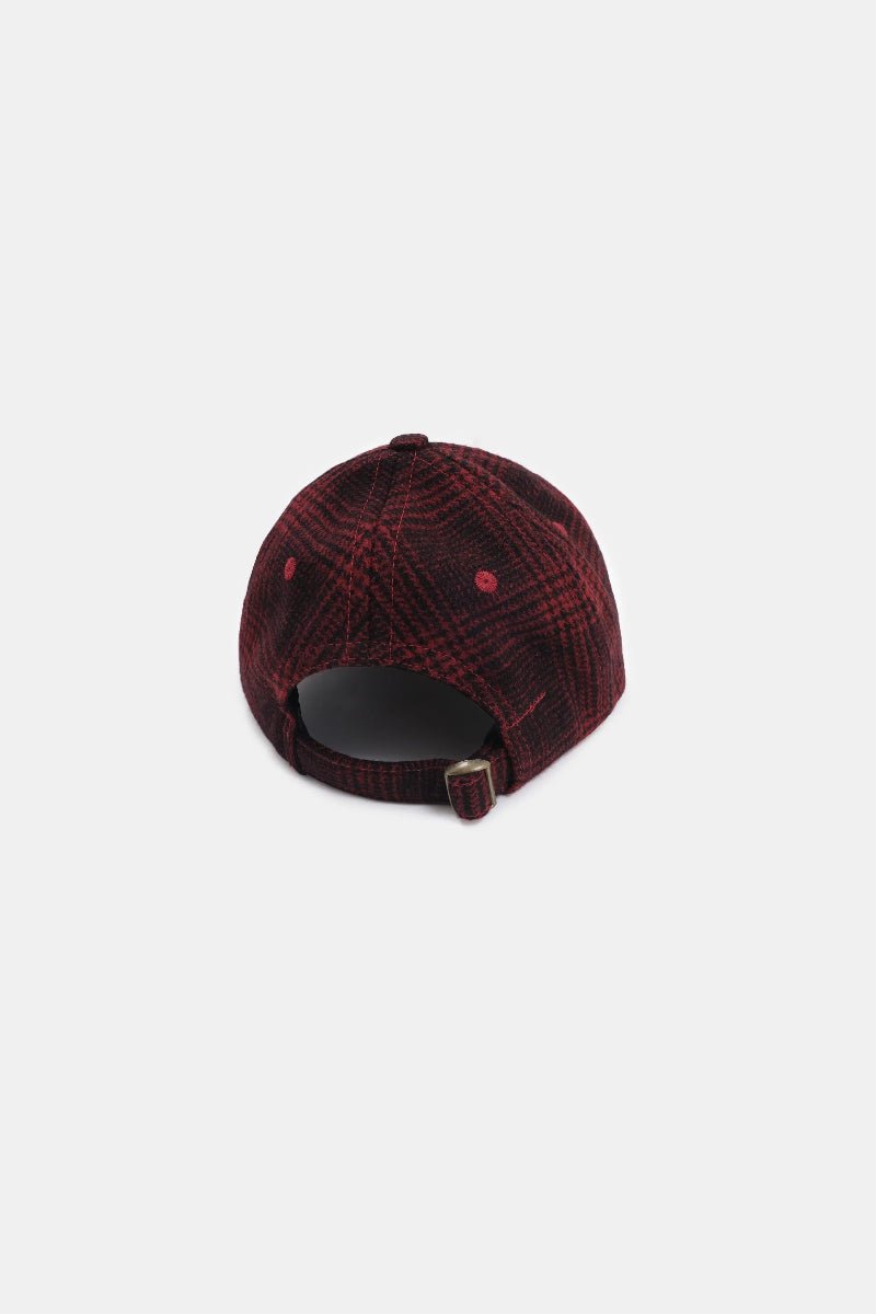 Red plaid cap on a white background