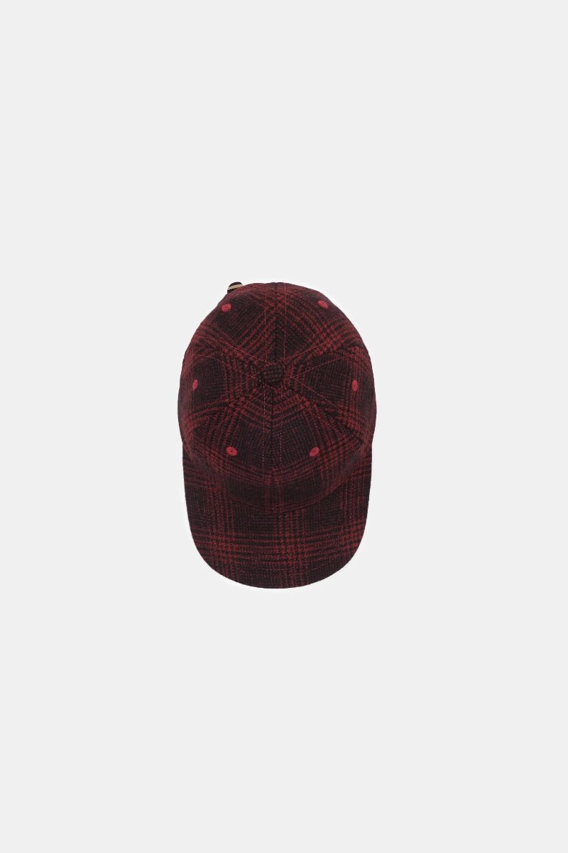 Red and black checkered cap on a white background