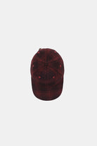 Red and black checkered cap on a white background