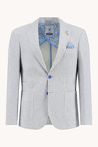 Light gray blazer with blue patterned lining and pocket square on a white background