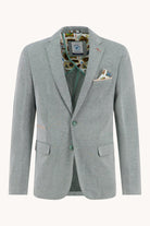 Gray blazer with patterned shirt and pocket square on a white background
