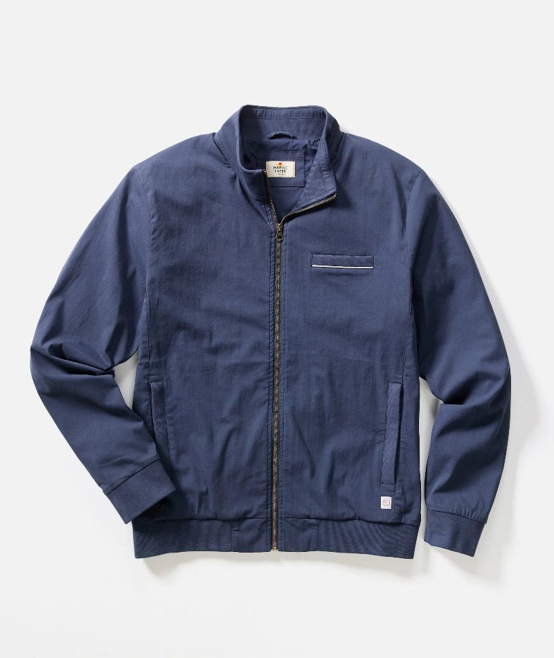 Blue jacket on a light gray background