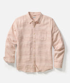 Pink checkered shirt on a light gray background