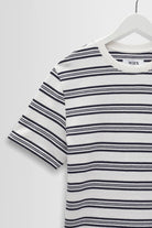 Striped t-shirt on a hanger with a white background