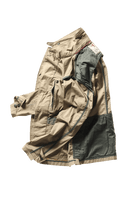 Beige and green jacket on a white background