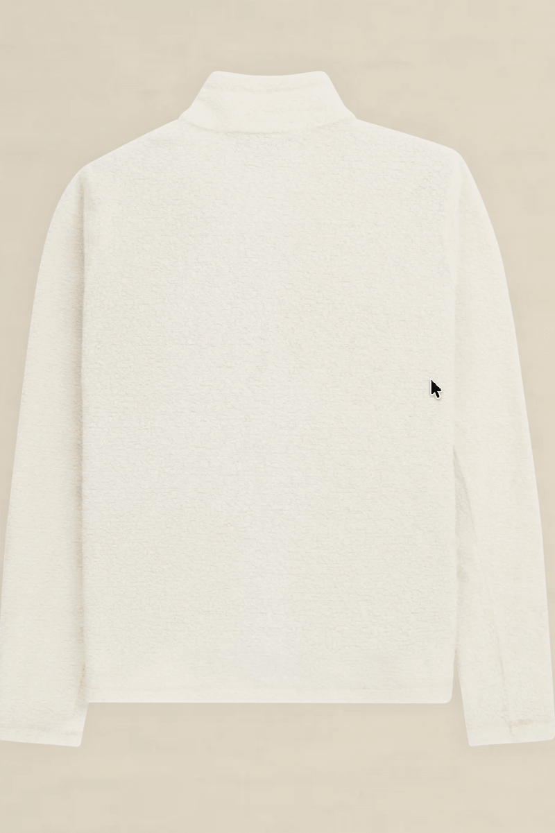 A white textured long-sleeve mock neck sweater shown from the back, featuring a small black embroidered mouse cursor logo on the left side, set against a solid beige background.
