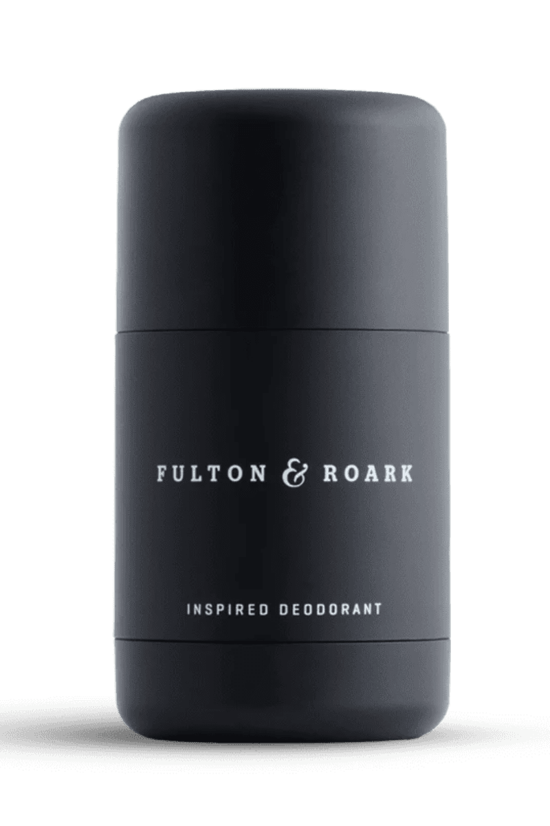 Black deodorant container with 'Fulton & Roark' branding on a white background
