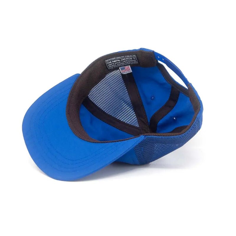 Blue cap with black mesh back on a white background