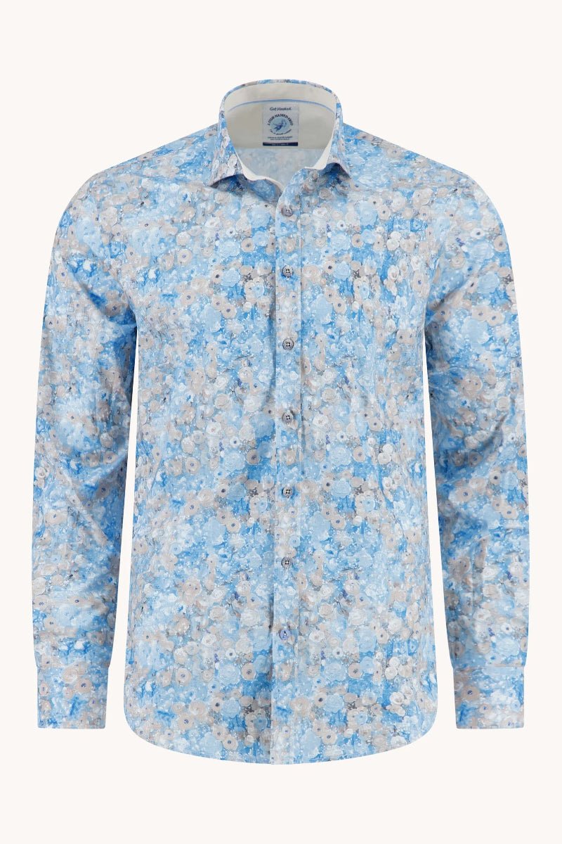 Blue floral patterned shirt on a white background