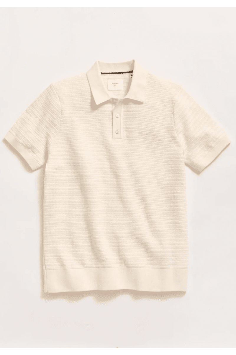 Beige striped polo shirt on a light gray background