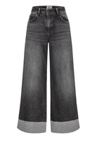 Wide-leg jeans with a grayish-black color on a white background