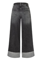 Black wide-leg jeans with gray hem on a white background
