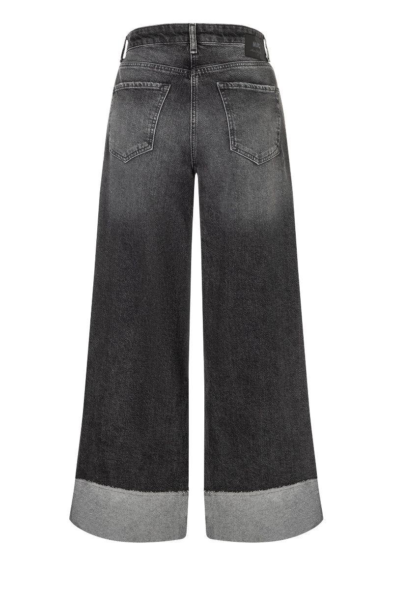 Black wide-leg jeans with gray hem on a white background