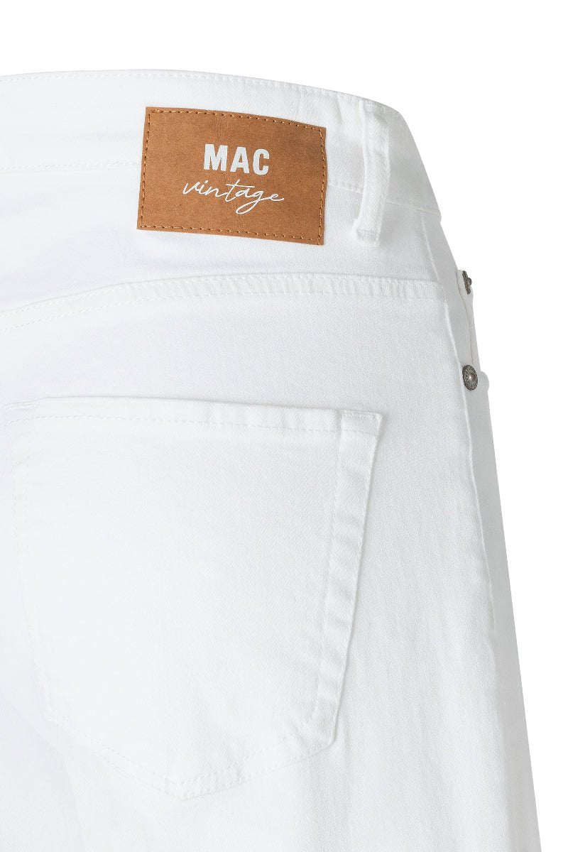 White pants with a brown label reading 'MAC vintage' on a white background
