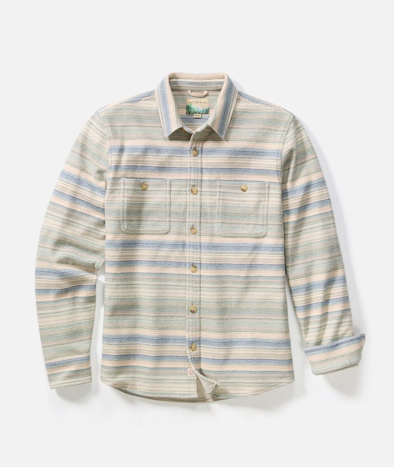 Striped shirt with blue and beige pattern on a white background