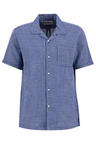 Blue checkered shirt with short sleeves on a white background