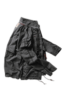 Black jacket with multiple pockets on a white background