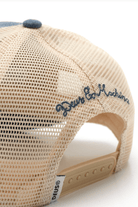 Beige mesh cap with blue embroidered text on a white background