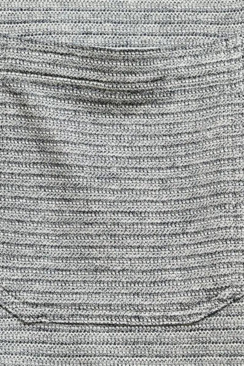 Close-up of gray textured fabric with a pocket